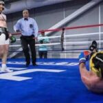Leaked Photo Showing Paulie Malignaggi floored by Conor McGregor