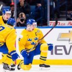 Sweden celebrate win vs USA in Semi-Final at World Junior Championship 2018