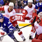 toronto maple leafs in scamble with detroit red wings