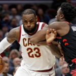 lebron james on push to the net against toronto raptors