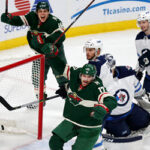 minnesota wilds celebrate second period goal against winnipeg jets