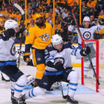 winnipeg jets celebrate scoring in game 1 against nashville predators