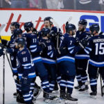 winnipeg jets celebrate winning game 5 and advancing in the playoffs