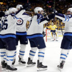 Winnipeg Jets celebrate after winning game 7 to advance to the western conference finals