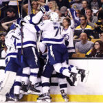 tampa bay lightning celebrate after scoring overtime goal and taking 3-1 lead in series