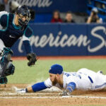 toronto blue jays slide home to win 5-2 after 4 run 8th inning