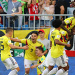 columbia celebrates after defeating senegal to advance to final 16