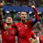 portugals cristiano ronaldo and ricardo quaresma celebrate after quaresma scored for portugal