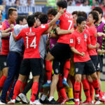 south korea celebrates after defeating germany 2-0 on wednesday.