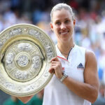 angelique kerber poses with trophy after winning wimbledon final in straight sets