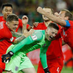 england celebrates after defeating columbia to move on to the quaterfinals