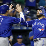 aledmys diaz high fives kevin pillar after he hits a two run homer last night in kansas