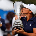 angela stanford kisses the evian championship trophy yesterday in evian, france