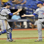 jays cather danny jansen congraulated closder ken giles after the blue jays defeated the tampa bay rays 7-6 on thursday