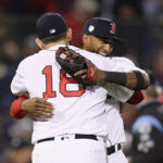red sox pitcher david price recieves congratulation hug from mitch mooreland after boston defeated los angeles to advance 2-0 in the world series