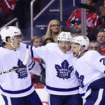 the toronto maple leafs celebrate after wining 4-2 against the washington capitals on saturday and earning thier fourth back-to-back win on the road this season