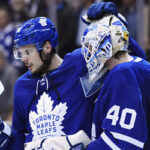 toronto goaltender garret sparks is congratulated by austin matthews after a 4-1 victory over the los angeles kings on monday night