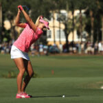 lexi thompson takes a shot on the fairway at the CME Group Tour Championship