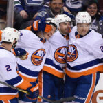 new york islanders celebrate after 7-5 win against rivals the new york rangers on tuesday night