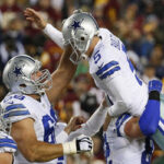 The Dallas Cowboys celebrate after moving into a tie for first in the nfc division with the washington Redskins on Thursday