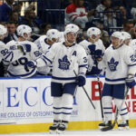 auston matthews is congratulated by teammates after scoring during overtime to give toronto a 4-3 victory over the buffalo sabres