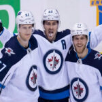mark scheifele celebrates scoring the winning goal last night against the vancouver canucks on saturday