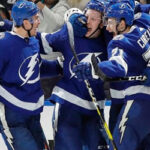 tampa bay's adam erne celebrates his second goal of the night against the montreal canadiens with with teammates last night in tampa.