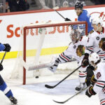 the chicago blackhawks protect their end zone against the winnipeg jets during overtime on friday night in chicago