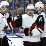 Vinnie Hinostroza receives congratulations from teammates Brad Richardson and Michael Grabner after scoring his 12th goal of the season last night in St. Louis.