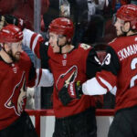 arizona's oliver ekman-larsson celebrates with teammates after the coyotes scored thursday night at the gila river arena