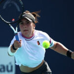 bianca andreescu returns service against sofia kenin during second round play at the miami open on friday