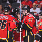 johnny gaudreau and sean monahan celebrate with teammates after defeating the columbus blue jackets on tuesday in calgary