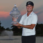 keith mitchell stands with his trophy after winning the honda classic in palm beach, california
