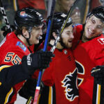 matthew tkachuk celebrates with teammates after scoring his first nhl hat trick last night against the vegas knights