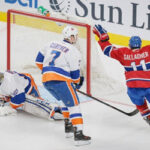 montreal's brendan gallagher raises his arms in celebration after scoring last night against the new york islanders
