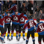 colorado avanlanche gabriel landskog, and carl soderberg celebrate with teammates after winning game 5 and eliminating the calgary flames