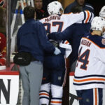 connor mcdavid is helped off the ice after slamming into the net during the oliers final regular season game on saturday