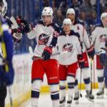 the columbus blue jackets get congratulatory fist pumps as they skate past the bench after scoring last night against the tampa bay lightning