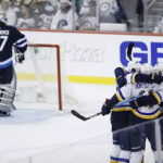 tyler bozak celebrates with teammates after scoring late in the third giving st. louis a one goal lead in game 1 of the western conference playoffs on wednesday night