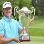 jake knapp poses with the canada life open trophy on sunday at the point grey golf & country club.