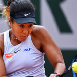 naomi osaka returns service against victoria azarenka in the second round at the french open in paris, france