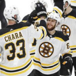 boston's zdeno chara high fives teammates after advancing to the stanley cup finals.