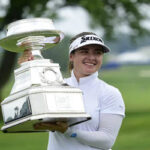 hannah green poses for the media with the kpmg women's pga championship trophy on sunday at the hazeltine national golf club