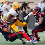 montreal's patrick levels takes down edmonton's C.J. Gable during second half of play on Saturday in front of over 16,000 in montreal at the percival molson memorial stadium