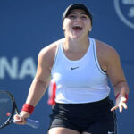 canadian bianca andreescu celebrates after her 3 set victoroy over the netherlands kiki bertens in Toronto at the aviva centre during third round play at the rogers cup