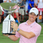 rory mcIlroy poses for the media with his trphy after winning the FedExCup on sunday.