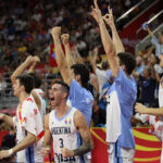 argentina celebrates after defeating serbia in the quarterfinals on tuesday in dongguan, china.