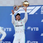 lewis hamilton celebrates with teammate valtteri bottas after winning his fifth consecutive russian grand prix on sunday