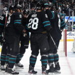 san jose shark joe pavelski celebrates with team mates after scoring his second goal last night against the vancouver canucks in san jose, california