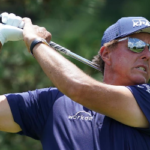 phil mickelson takes a shot on the fairway during the travelers championship on friday in cromwell, connecticut